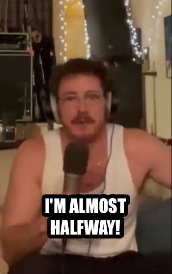 Screen shot of Tom Cardy singing his Lord of the Rings song, yelling ALMOST HALFWAY!